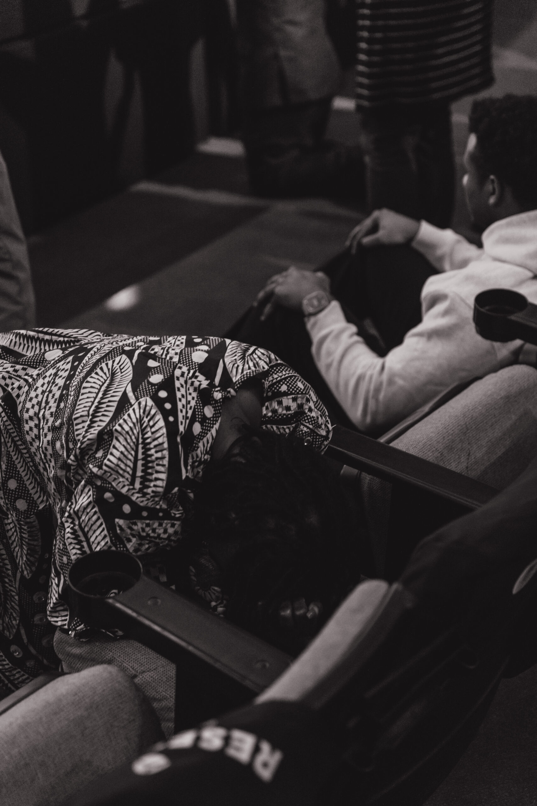 Woman is knelt at her sit making an altar to pray